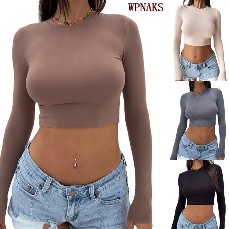 "Update your wardrobe with the WPNAKS Y2K Crop Top"