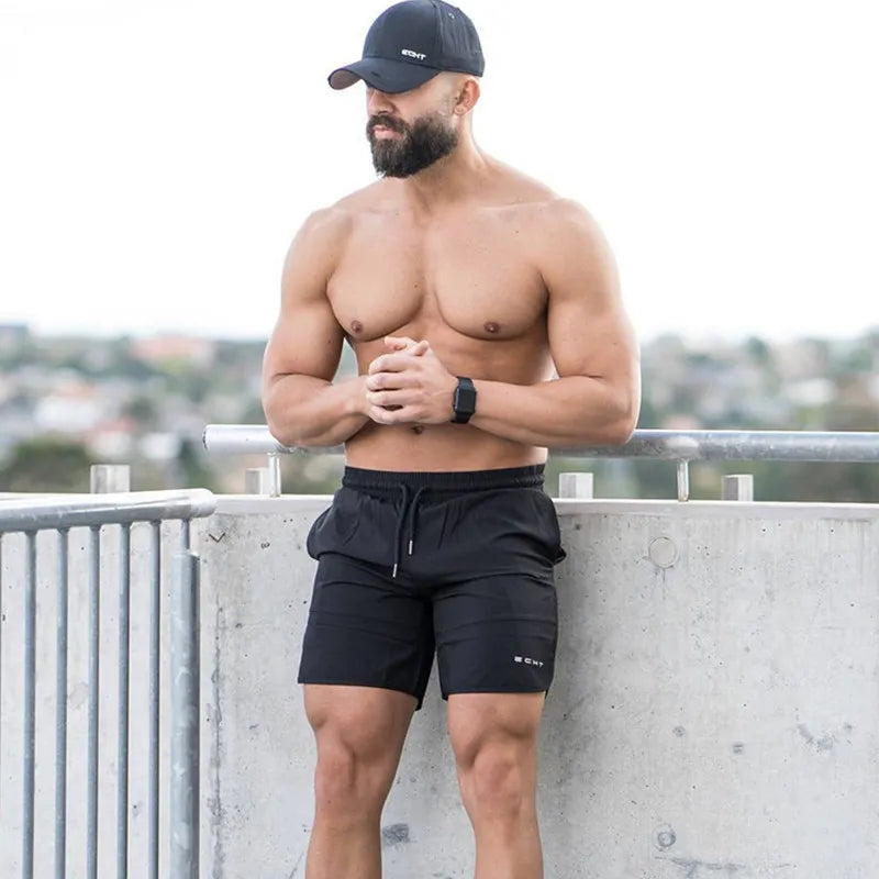 "Enhance your workout and casual wear with our New Men's Gym Fitness Loose Shorts"