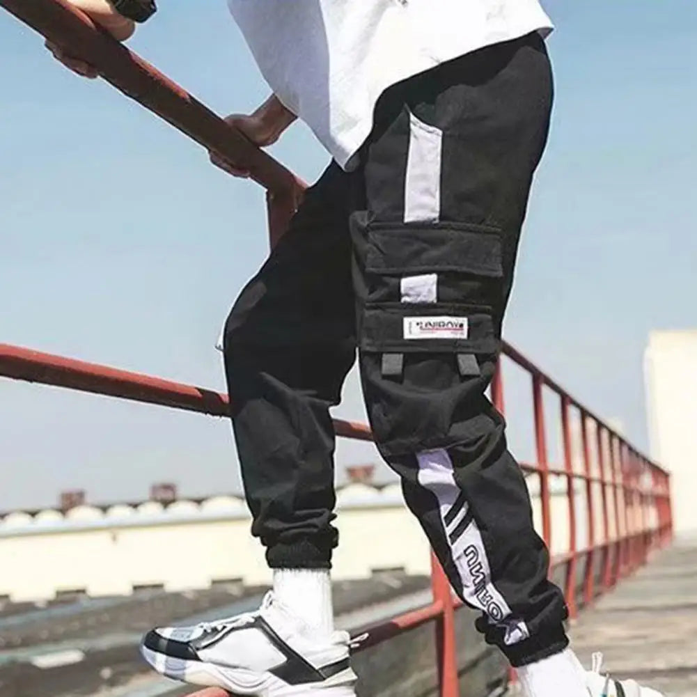 "Step up your street wear game with these Men’s Contrast Color Cargo Jogger Pants"