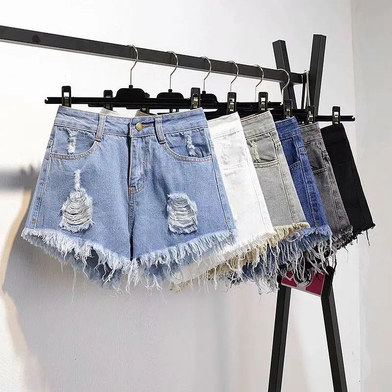 "Elevate your summer wardrobe with these Women’s High-Waisted Ruffled Denim Shorts"