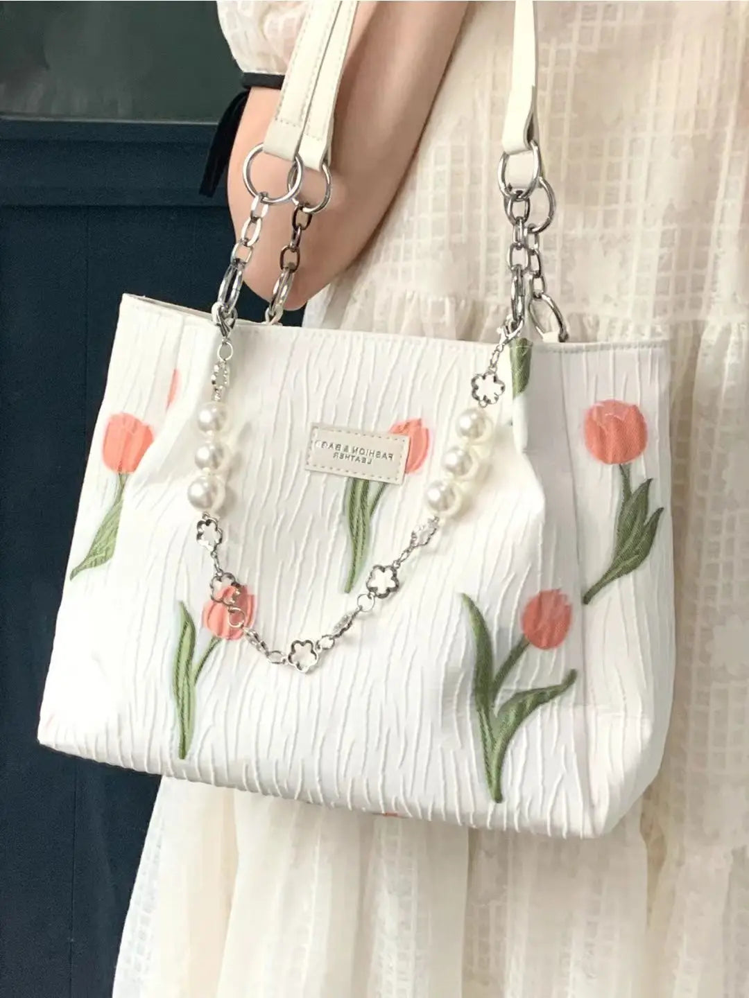 "Embrace elegance with our Women's Designer Floral Handbag"