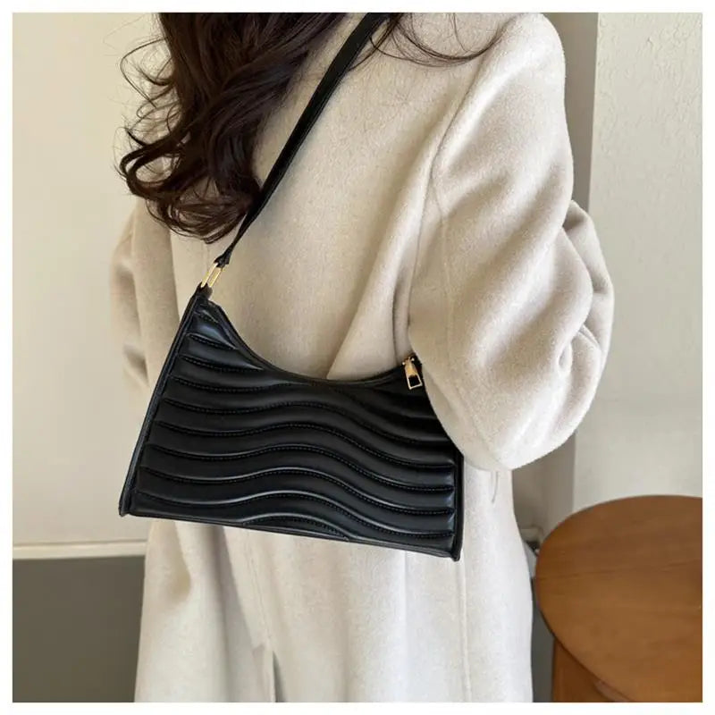 "Elevate your everyday style with our Women's Minimalist Underarm Bag"