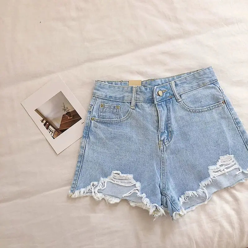 "Women's High-Waist Irregular White Denim Shorts for Spring and Summer"