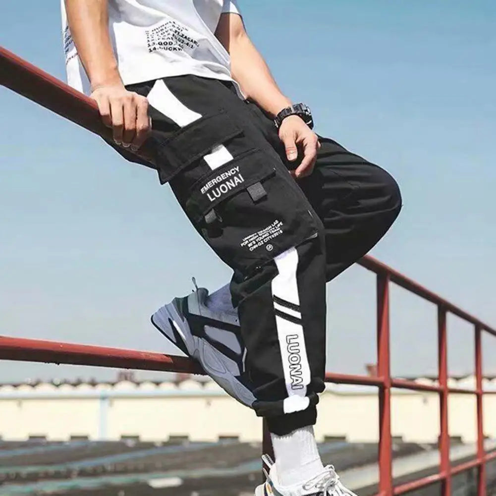 "Step up your street wear game with these Men’s Contrast Color Cargo Jogger Pants"