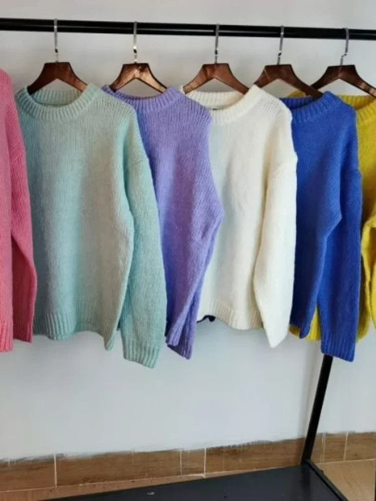 "Stay cozy and stylish this winter with our Women's Oversized Pink Pullover Sweater"