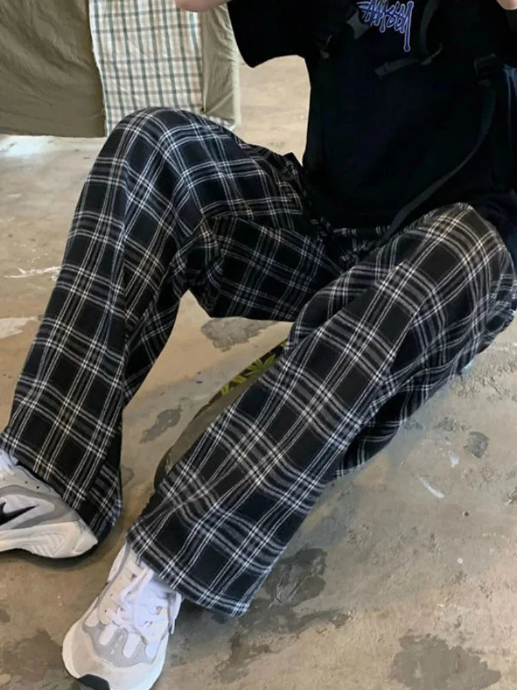 "Introducing our Women JMPRS Black Plaid Pants"