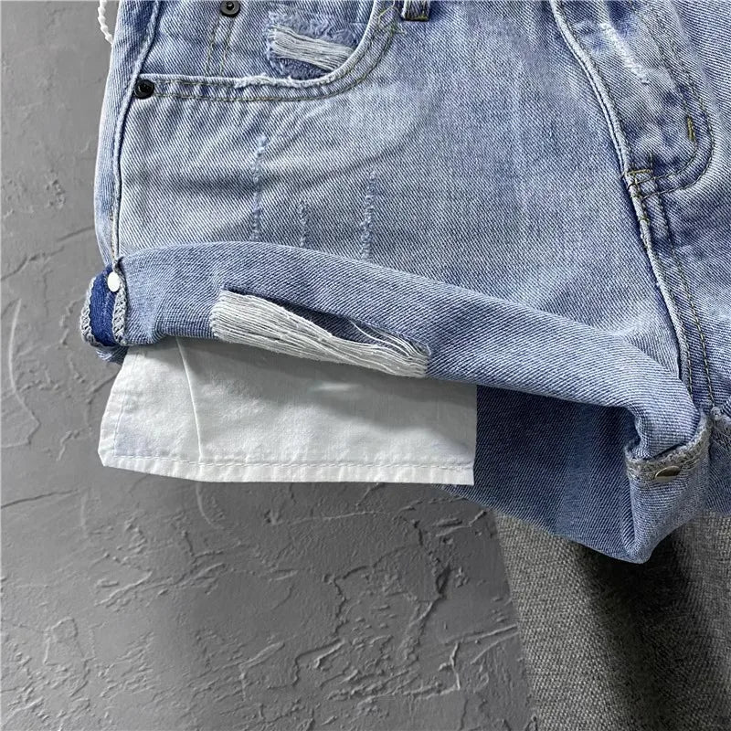 "Step into summer with style in our Women's Light Blue Low-Waisted Denim Shorts"