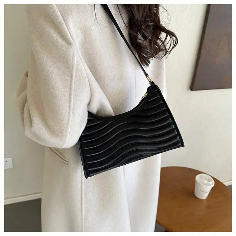 "Elevate your everyday style with our Women's Minimalist Underarm Bag"