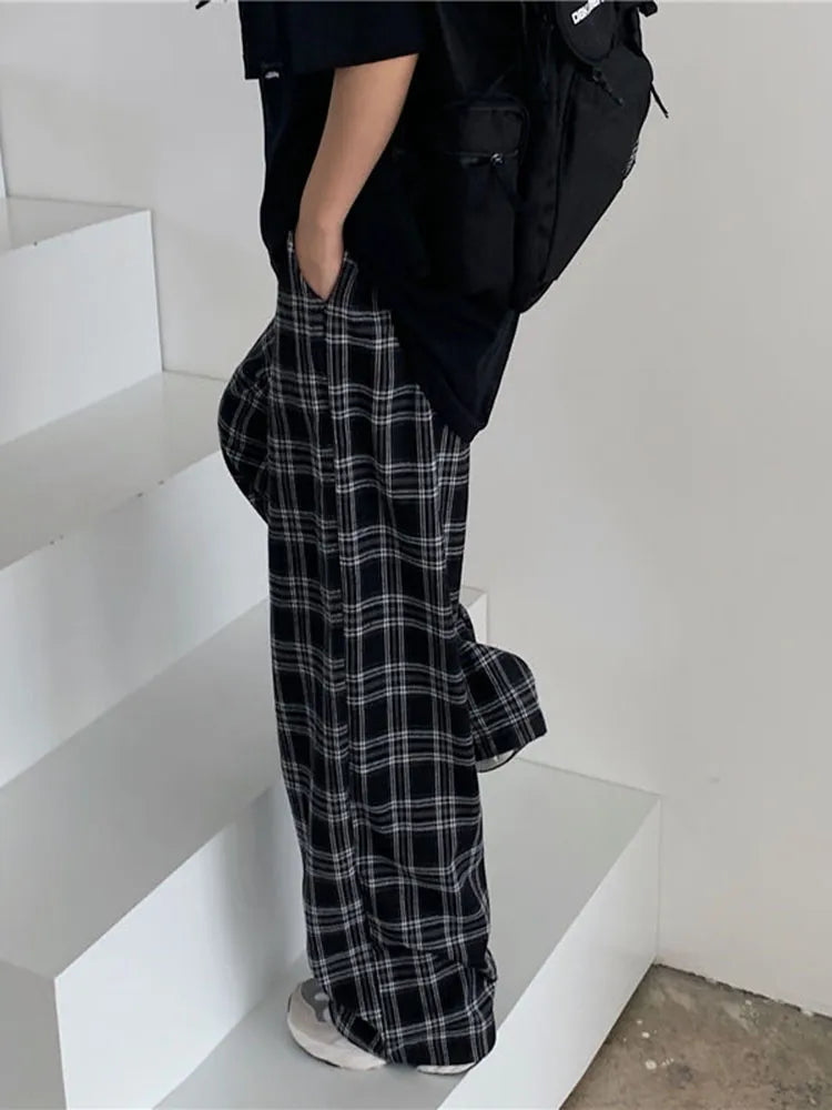 "Introducing our Women JMPRS Black Plaid Pants"