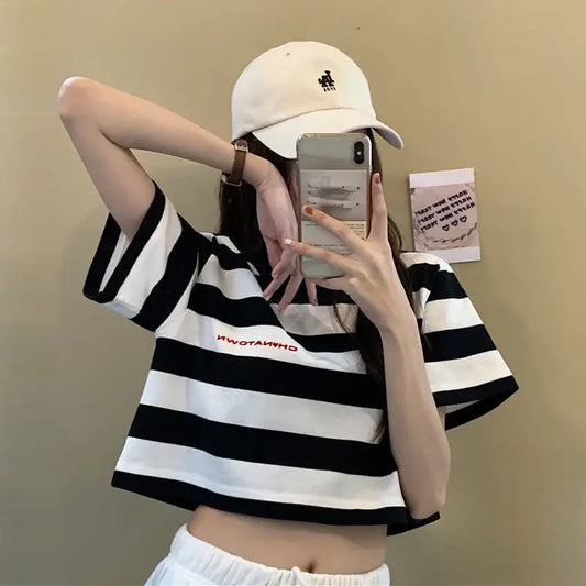 "Elevate your summer style with our Women's Black and White Striped Cropped Top"