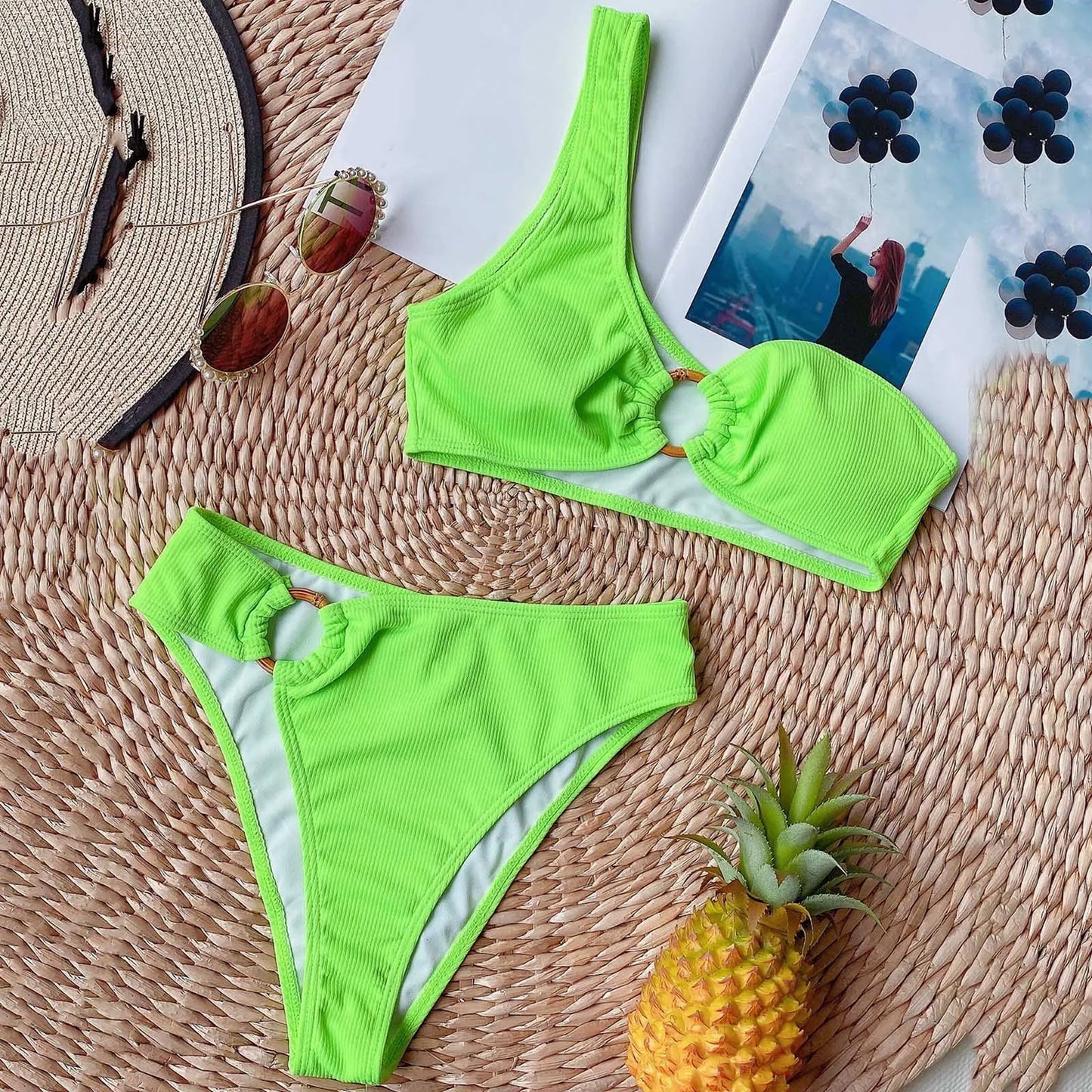 "Elevate your swimwear collection with our Sexy One-Shoulder Bikini Set"