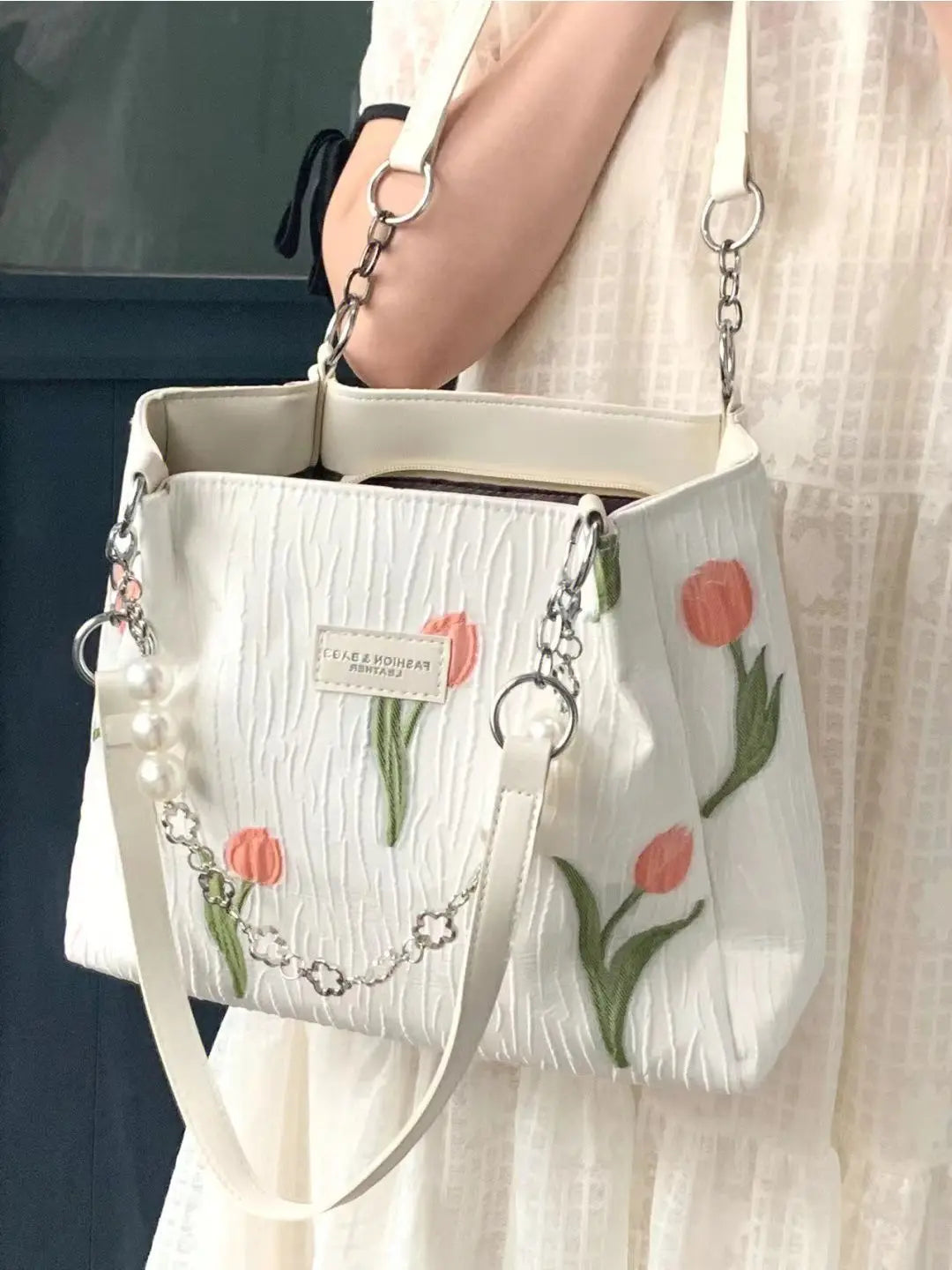 "Embrace elegance with our Women's Designer Floral Handbag"