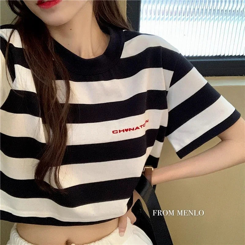 "Elevate your summer style with our Women's Black and White Striped Cropped Top"