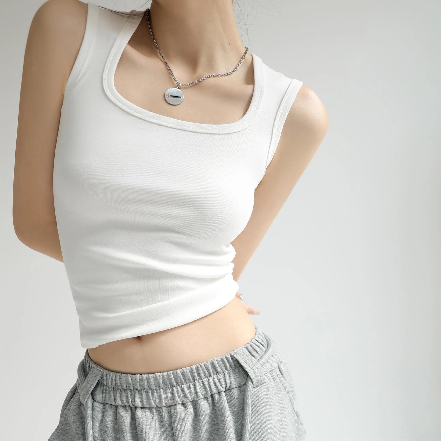 Korea Stylish Sleeveless Crop Top: Elevate Your Summer Wardrobe Essentials.