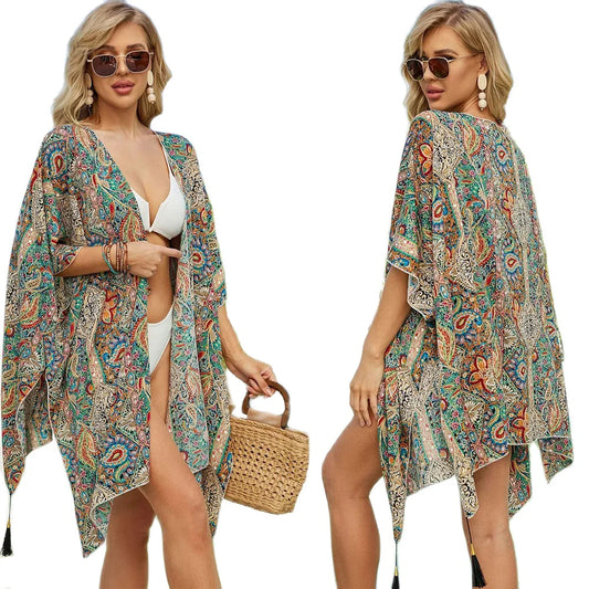 "Enhance your beachwear collection with our Women's Floral Loose Tassel Cover-Up Kimono"