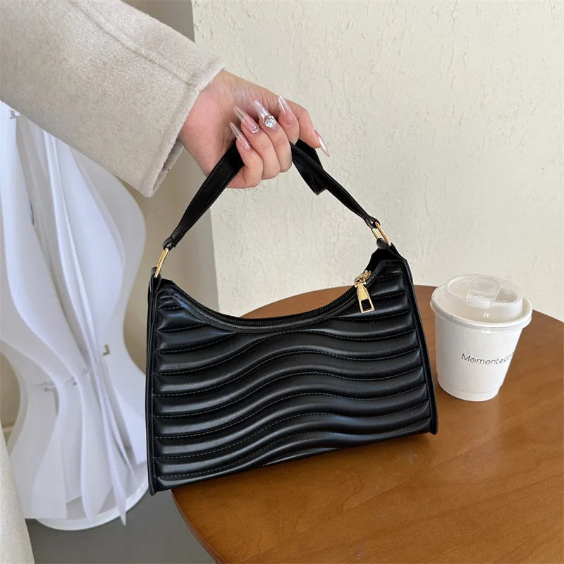 "Elevate your everyday style with our Women's Minimalist Underarm Bag"