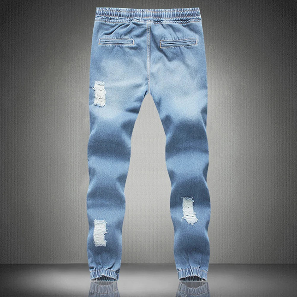 "Step up your style game with our Men's Fashion Slim Fit Ripped Jeans"